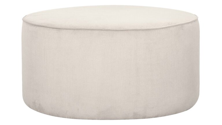 pouf rond en tissu velours écru dans un intérieur moderne